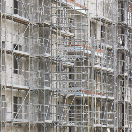 Scaffolding structure on a building. Construction architecture industry. Workplace